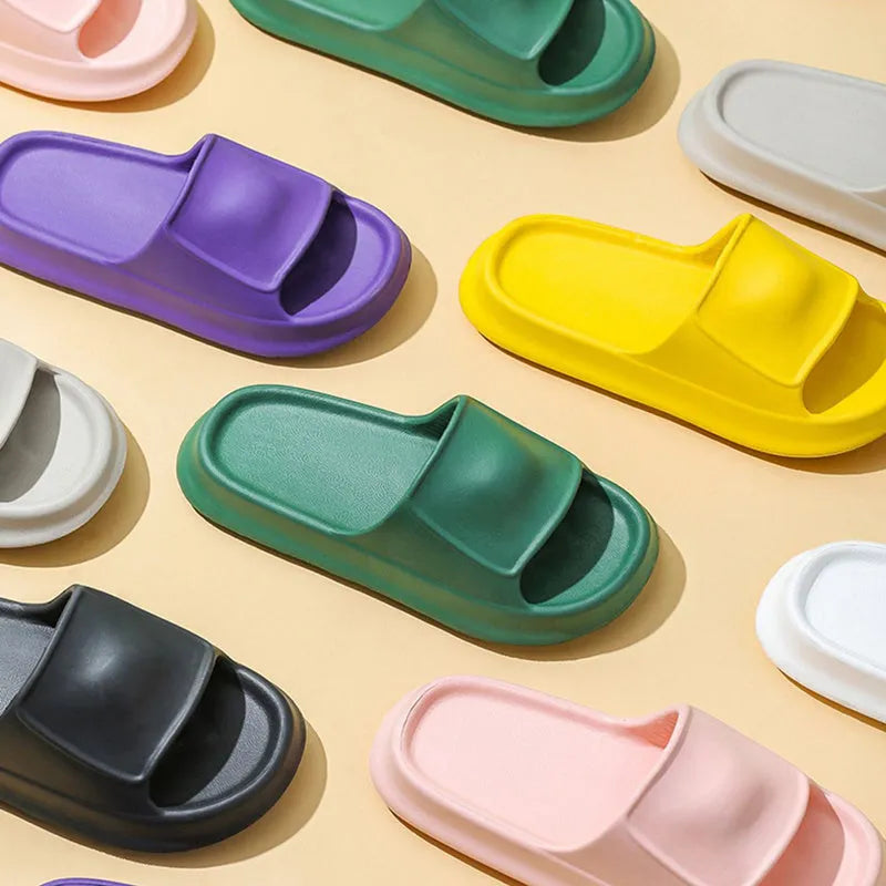 EVA flip-flop slippers with thick sole in multiple colours on a white background
