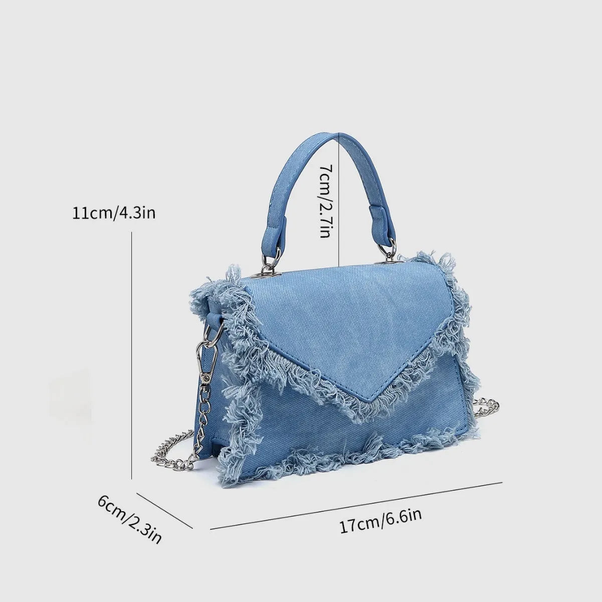 Retro tassel bag mini crossbody bag in denim blue colour, PU material, with tassel detail and crossbody strap.