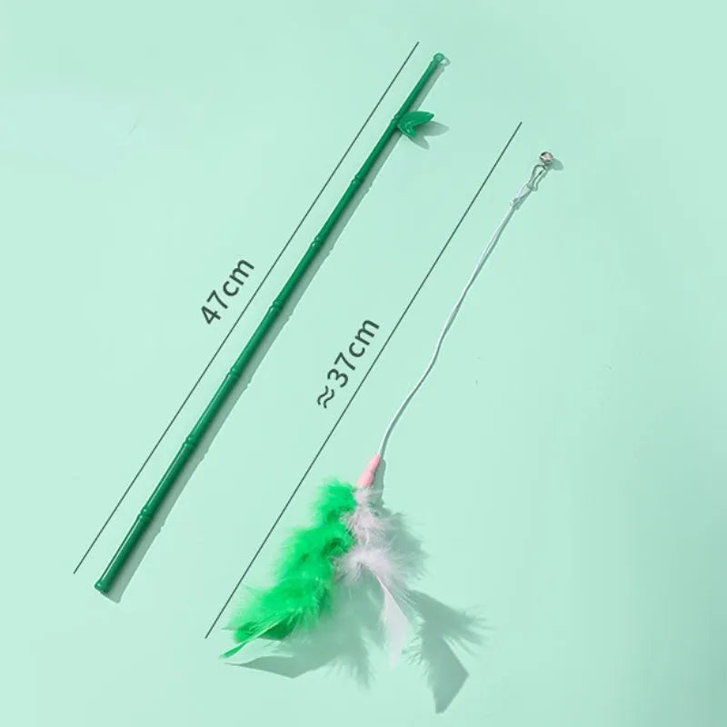 Green cat feather wand toy with bell and feather attachments for interactive play