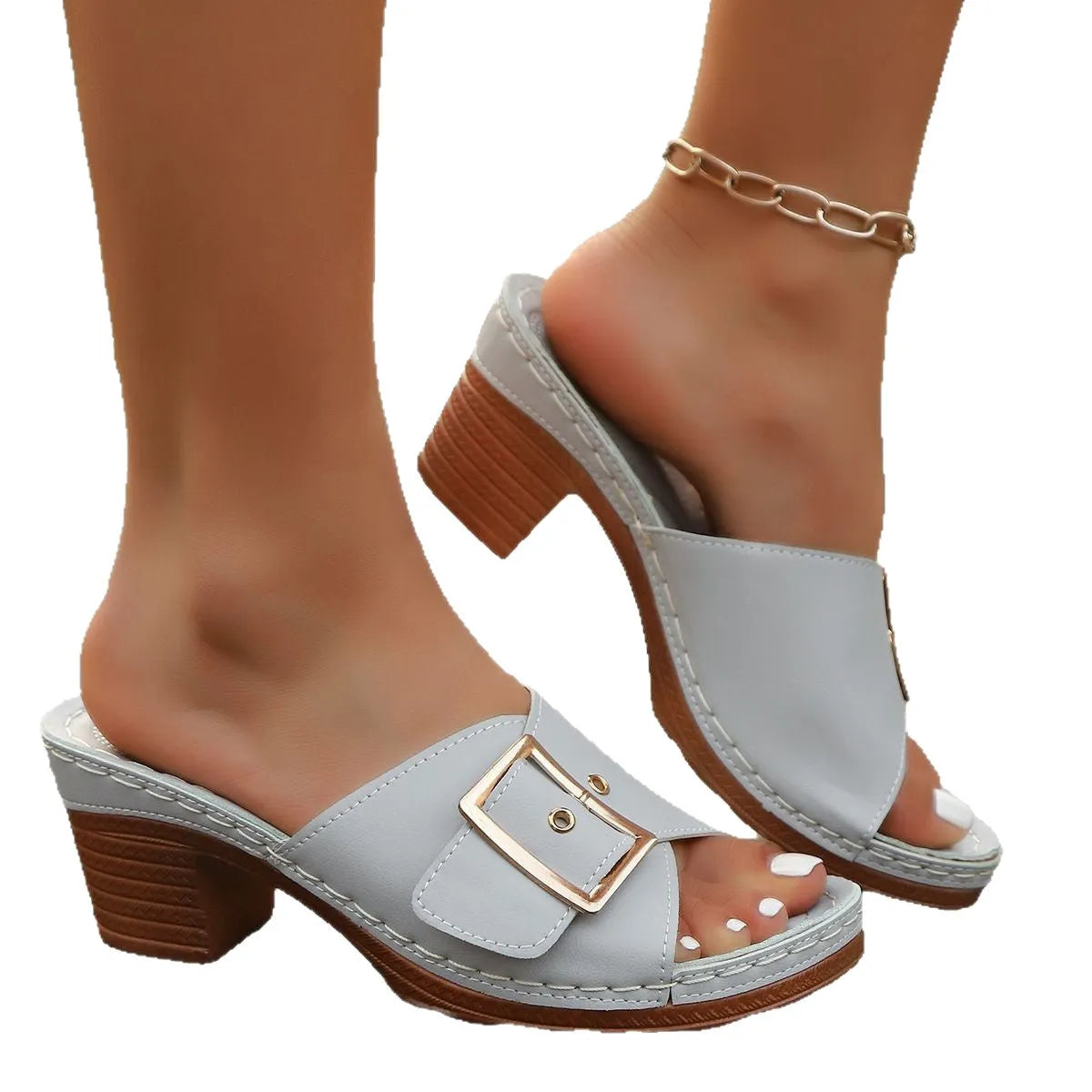 Women's black retro slippers with a chunky block heel and silver metal buckle closure