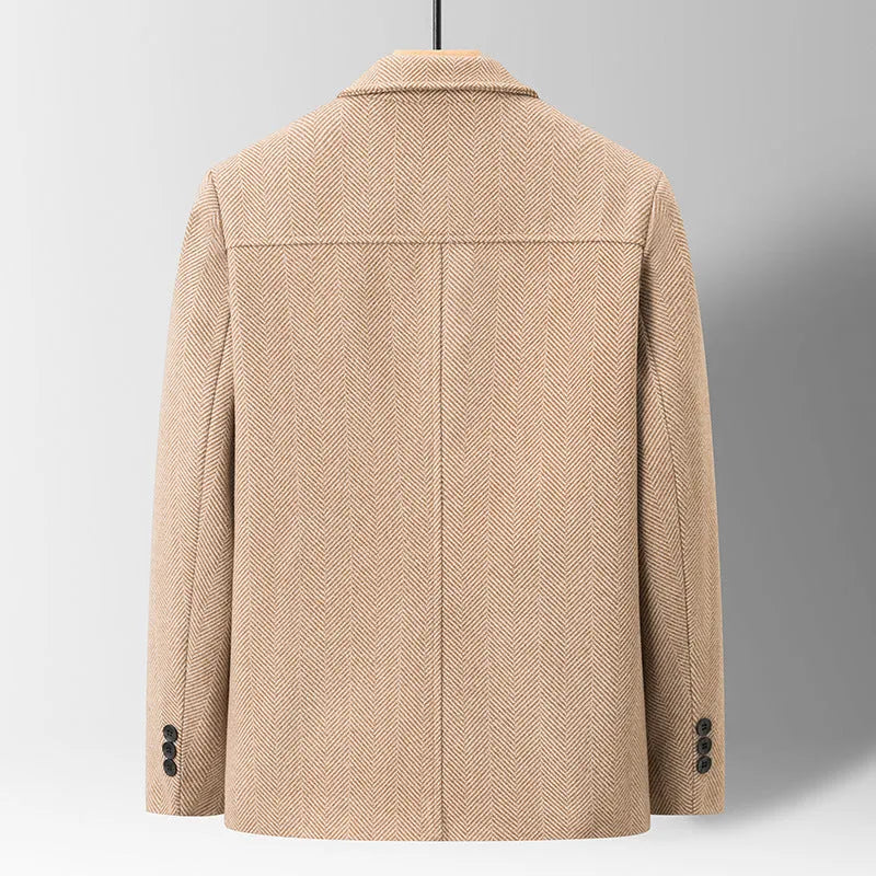 Men's slim lapel woolen jacket in gray with non-ironing finish and side patch pockets on a plain background
