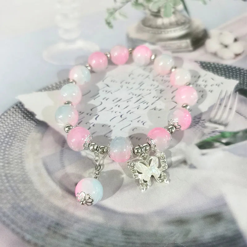 Chinese style glass bracelet with bamboo joint details in a red Lvzhu Duobao design.