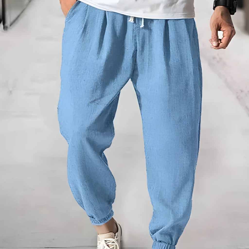 Men's casual cotton trousers in loose ankle-band fit for summer wear