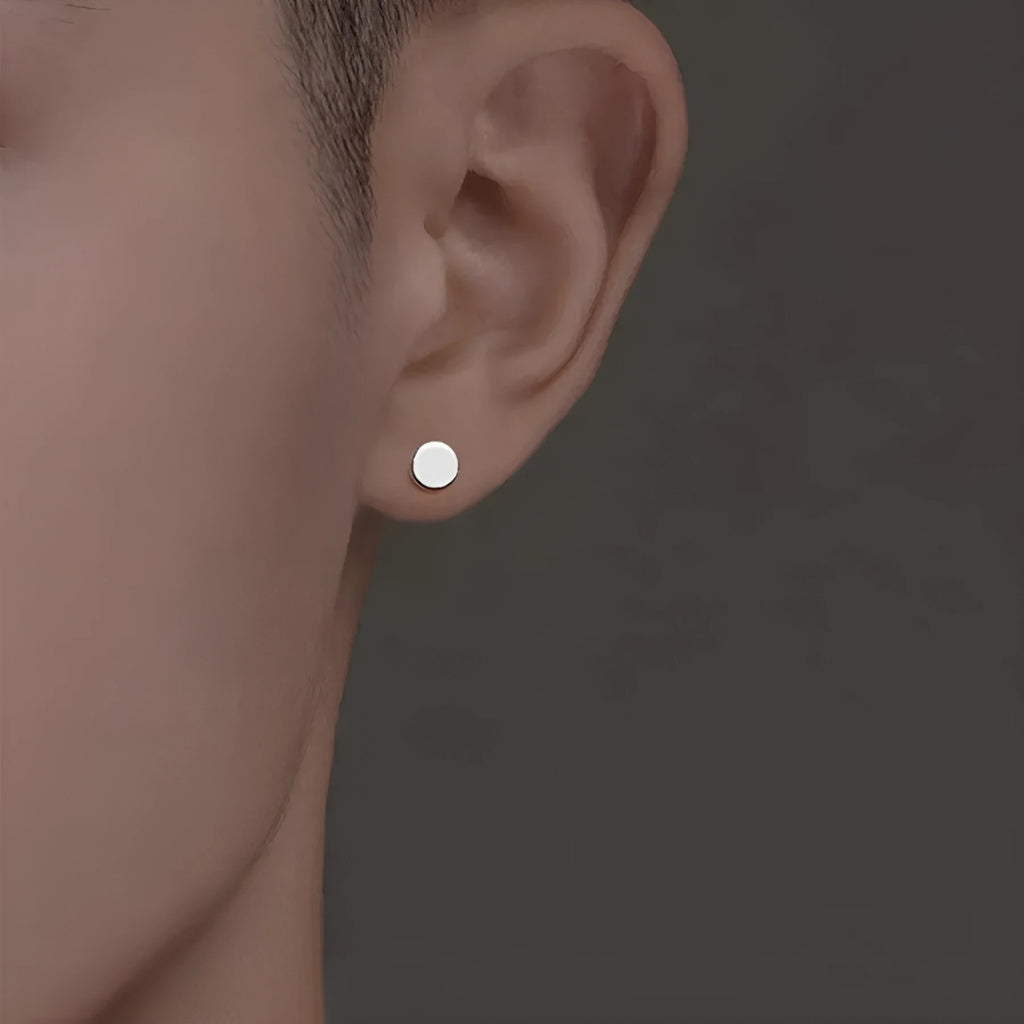Sterling silver S999 flat ear bone stud earrings with round geometric design in silver and black colours