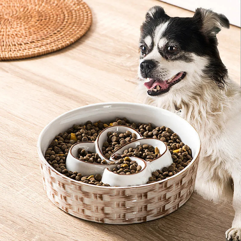 Blue ceramic slow feeder dog bowl with raised ridges for medium and large dogs on non-slip base