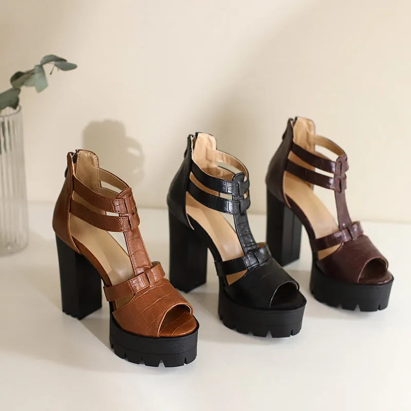 Women's black platform high heel sandals with a round toe and a back zipper fastening.