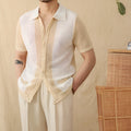 Beige short sleeve knitted cardigan with lapel collar, made from linen and cotton blend fabric.