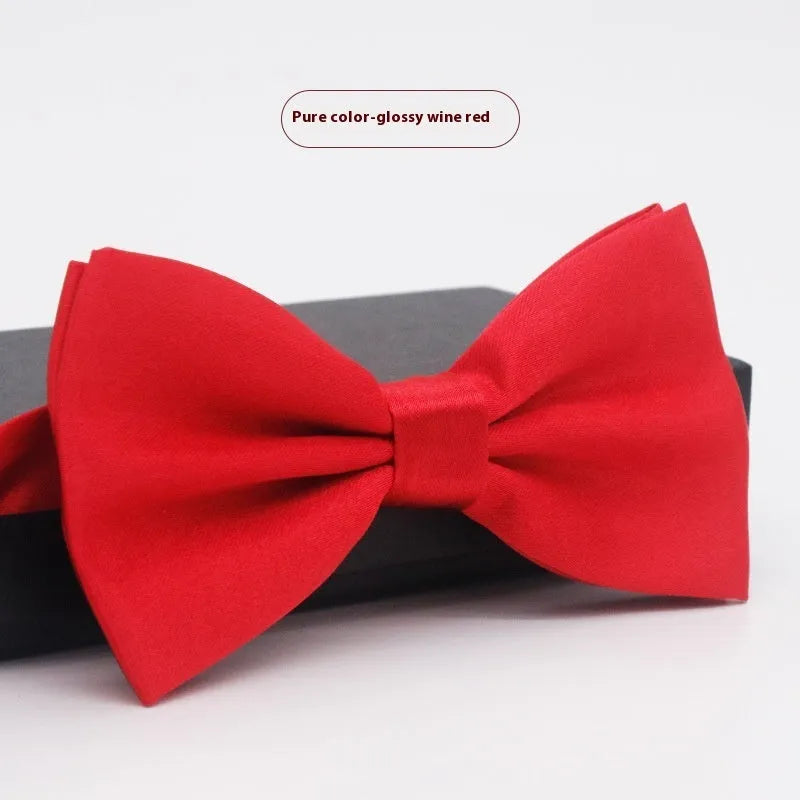 Solid colour polyester bow tie with flat head design measuring 12cm by 6cm