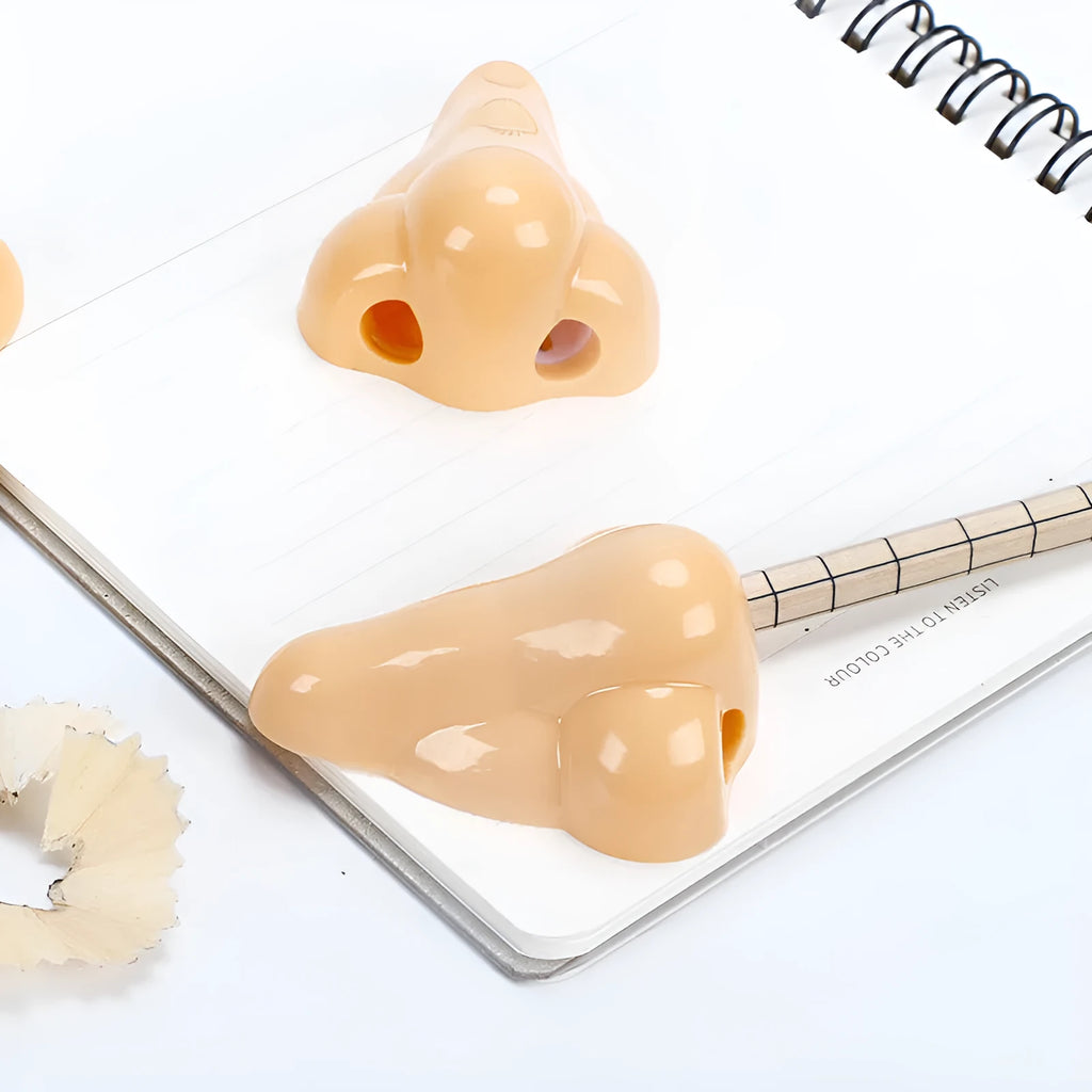 Flesh colour geometry-shaped plastic pencil sharpener with big nostril opening for manual pencil sharpening