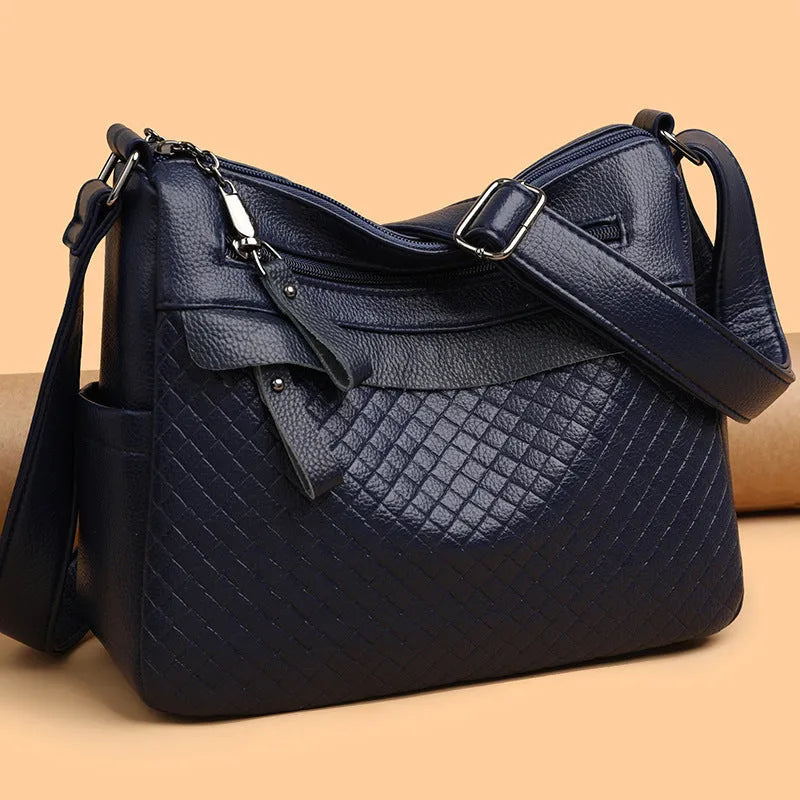 Women's soft PU leather crossbody bag in black with diamond pattern stitching, vertical rectangle shape 28x22x11cm
