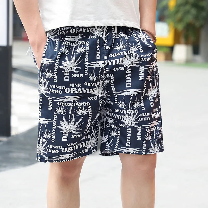 Men's floral print five-point swimming trunks in polyester fabric, free size