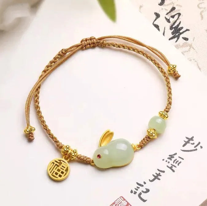 Hetian jade geometric rabbit charm bracelet on a yellow string for women