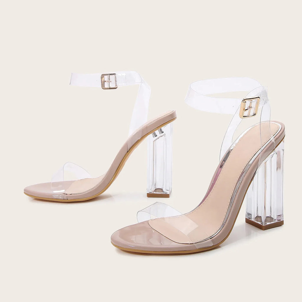 Apricot coloured women's high heel sandals with glass heels, round toe, and a buckle strap.