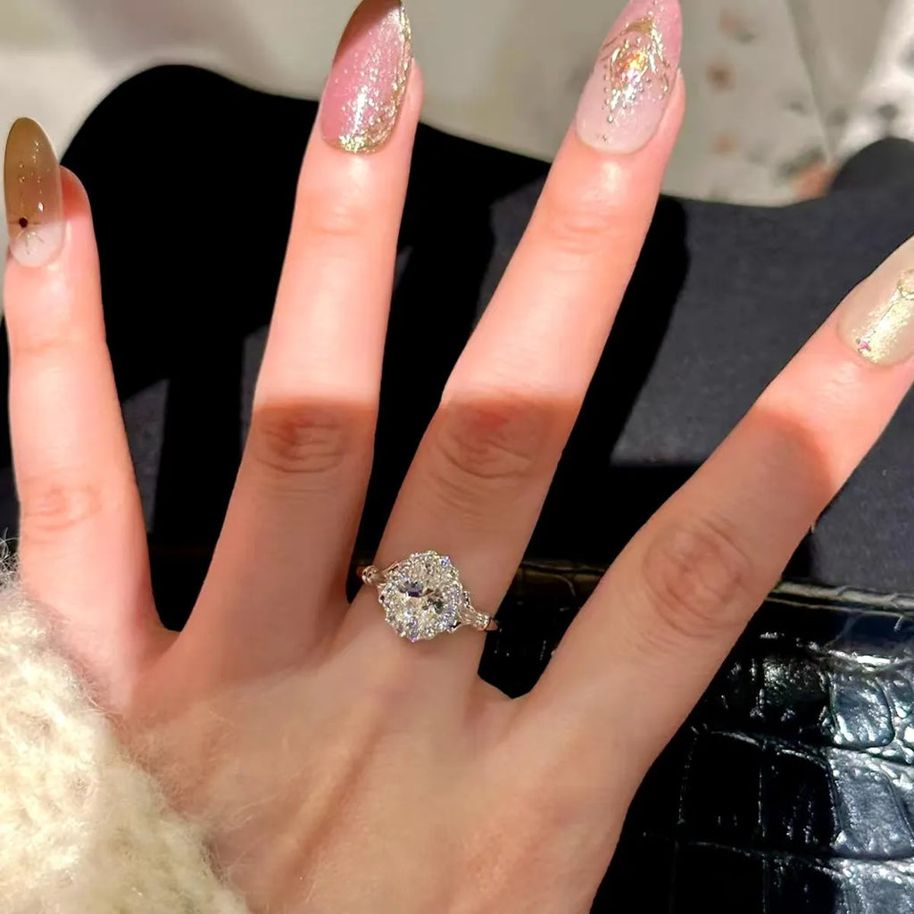 Silver geometric ellipse ring with adjustable opening and diamond treatment