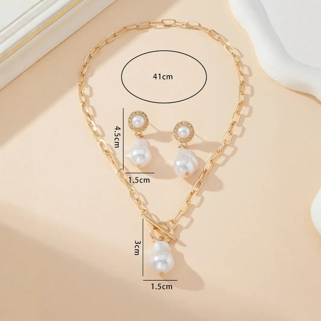 Gold-coloured baroque pearl necklace and matching earrings jewellery set for women