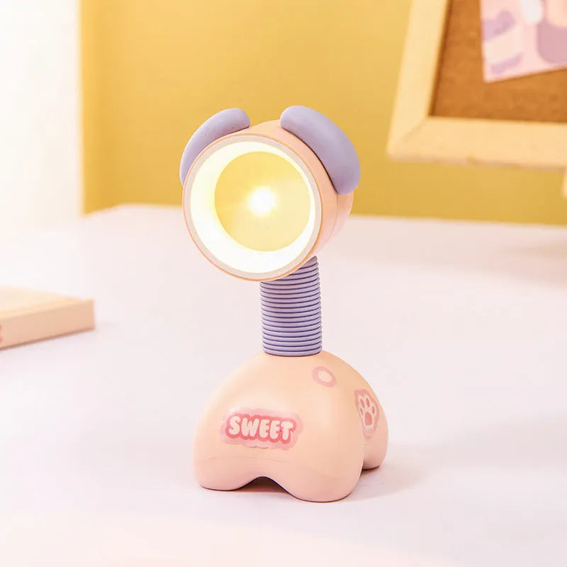 Cartoon animal magnetic night lamp with adjustable head on metallic surface