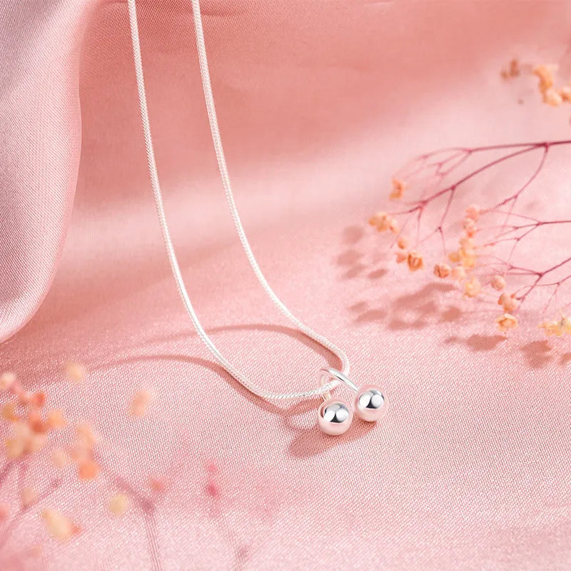 Women's silver cherry necklace with adjustable snake bone chain and fruit pendant
