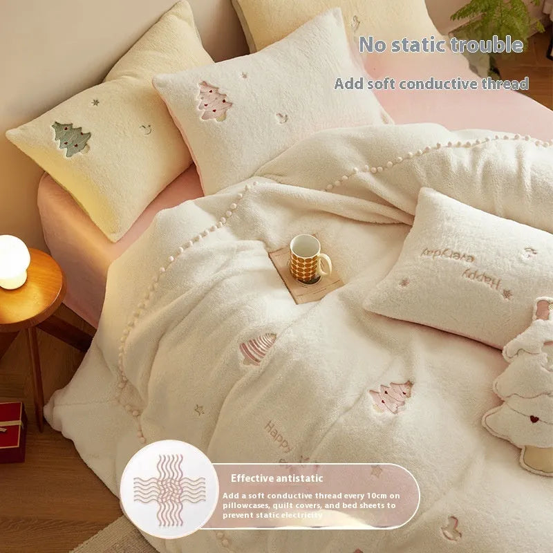Milk fibre bedding four-piece set with green Christmas tree pattern on duvet cover, sheet, and pillowcases.