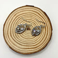 Silver-coloured leaf earrings with embedded colourful moonstones, drop design for women