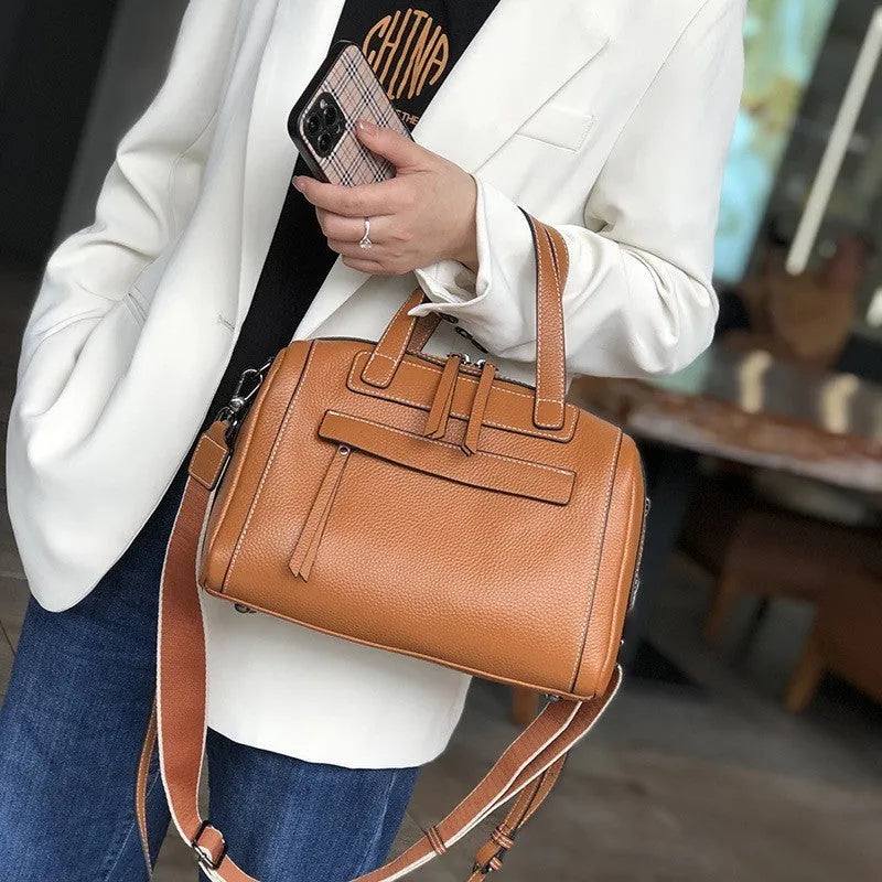 Genuine leather messenger bag with Boston lychee pattern stitching showing horizontal square shape and shoulder strap