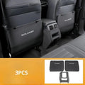 Set of three leather anti-kick pads for a Mitsubishi Outlander car seat armrest and box.