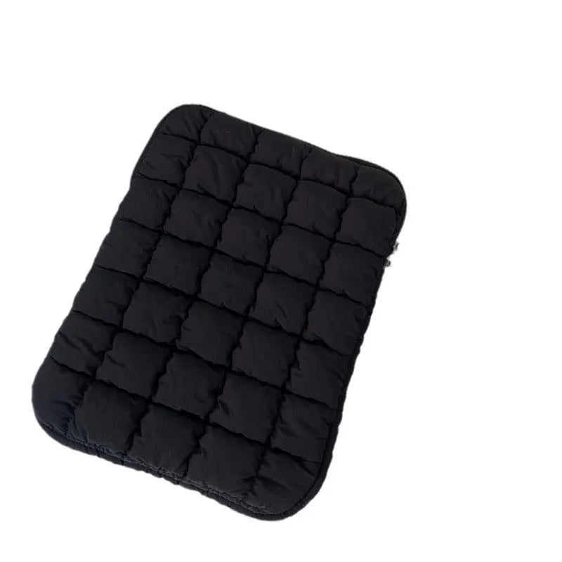 Black nylon laptop bag with cloud cotton interior padding shown next to a white version, sized for a 15.6-inch laptop.