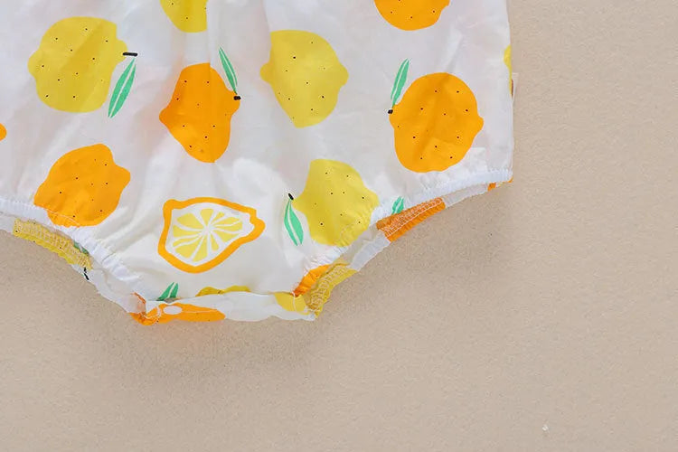 Cotton summer baby romper triangle jumpsuit in yellow with removable hat on white background