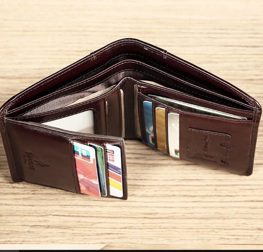 Men's leather wallet showing internal compartments for cards, cash, coins and documents