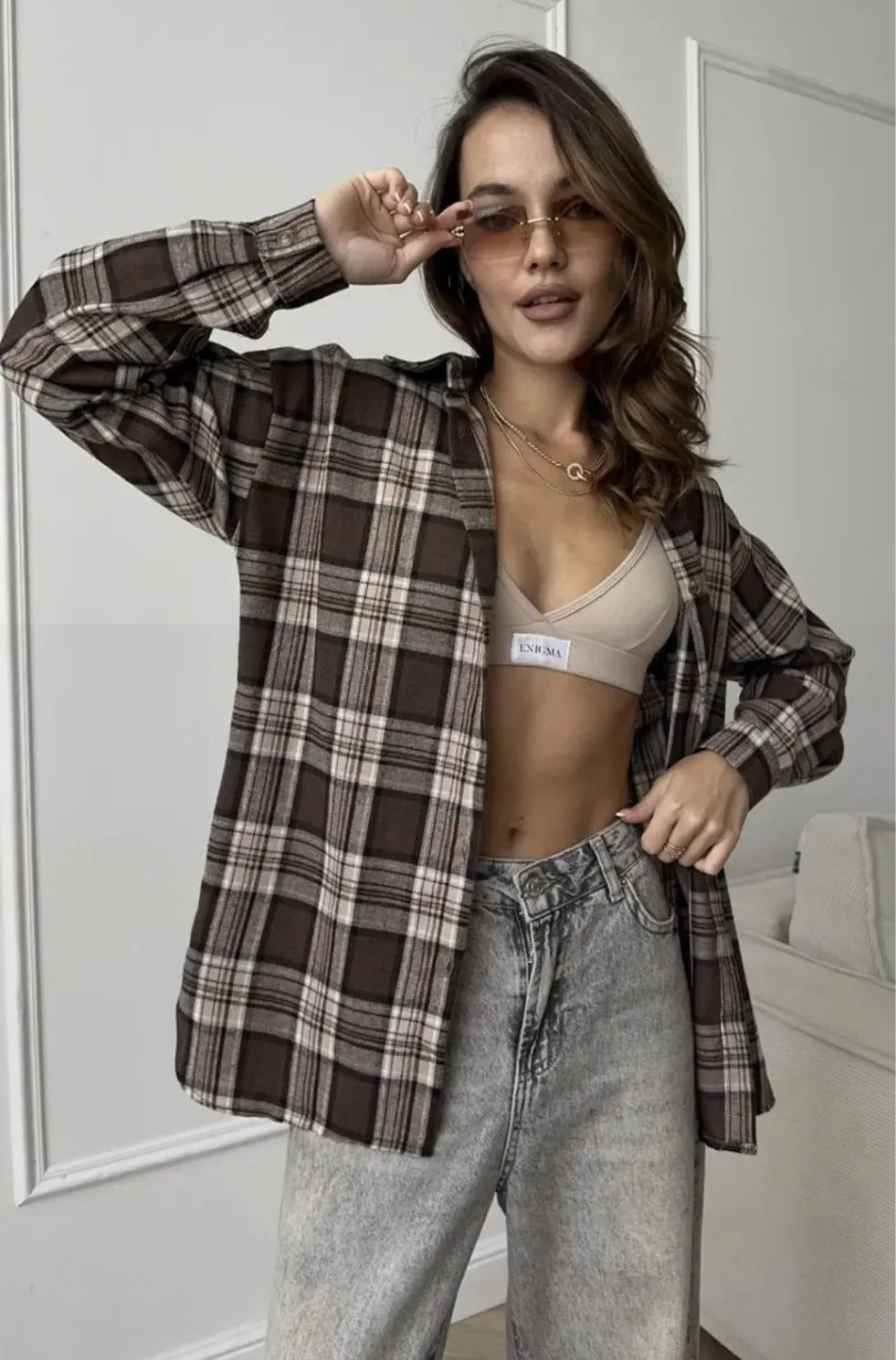 Dark brown striped retro women's shirt with long sleeves and collar styling
