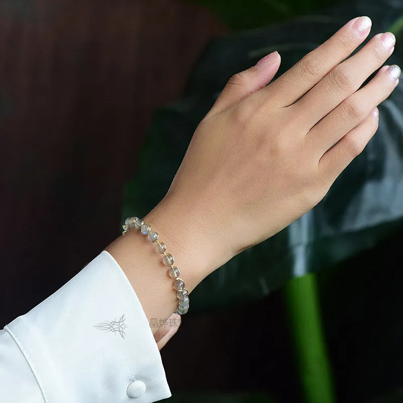 14K gold-plated women's bracelet with 6mm blue moonstone beads and metal starry sky accents