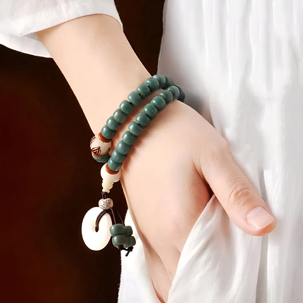 Natural bodhi seed bracelet with double ring safety buckle and lotus bead design