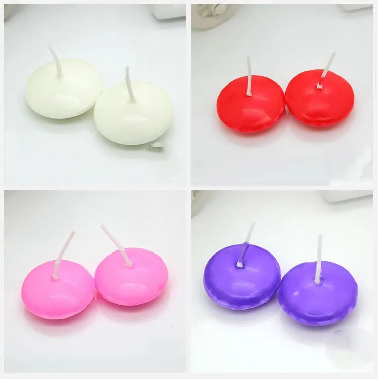 Ivory white cylindrical floating candles made of paraffin wax in a 10 pack for wedding decor
