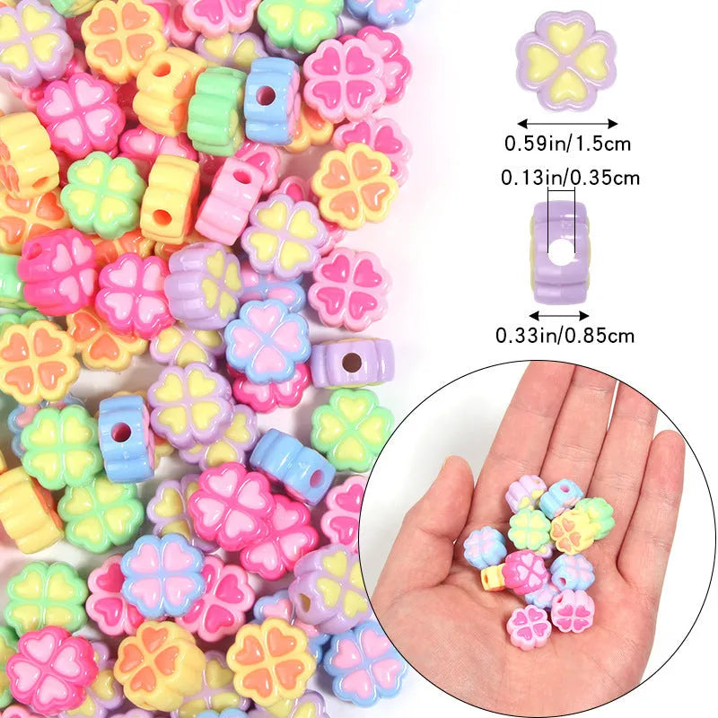 Assortment of 15mm frosted acrylic four-leaf clover beads in rose red, pink, yellow, green, blue, and purple colours.