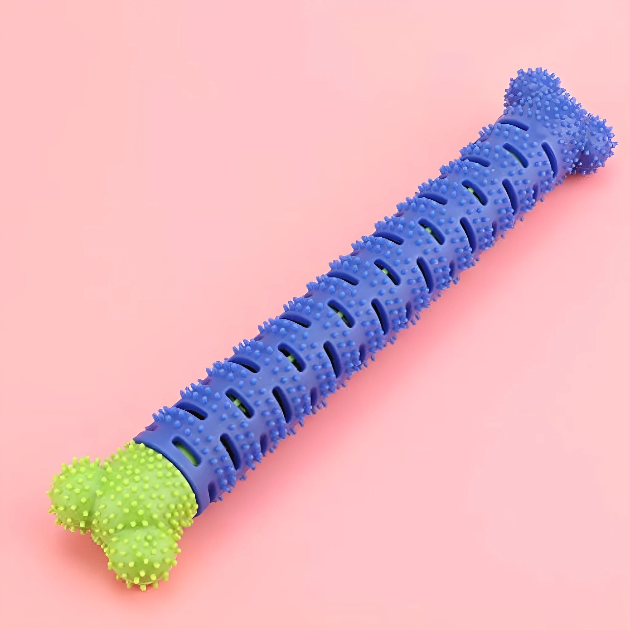 Blue and green dog dental chew toy with textured brush head and massage nodules for teeth cleaning and gum care.