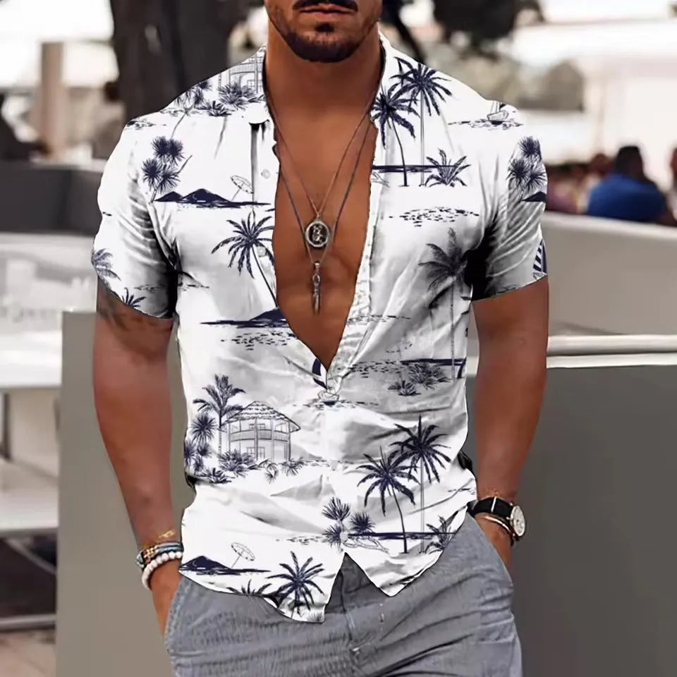 Man wearing a loose-fit short sleeve shirt with a colourful digital flower print pattern.