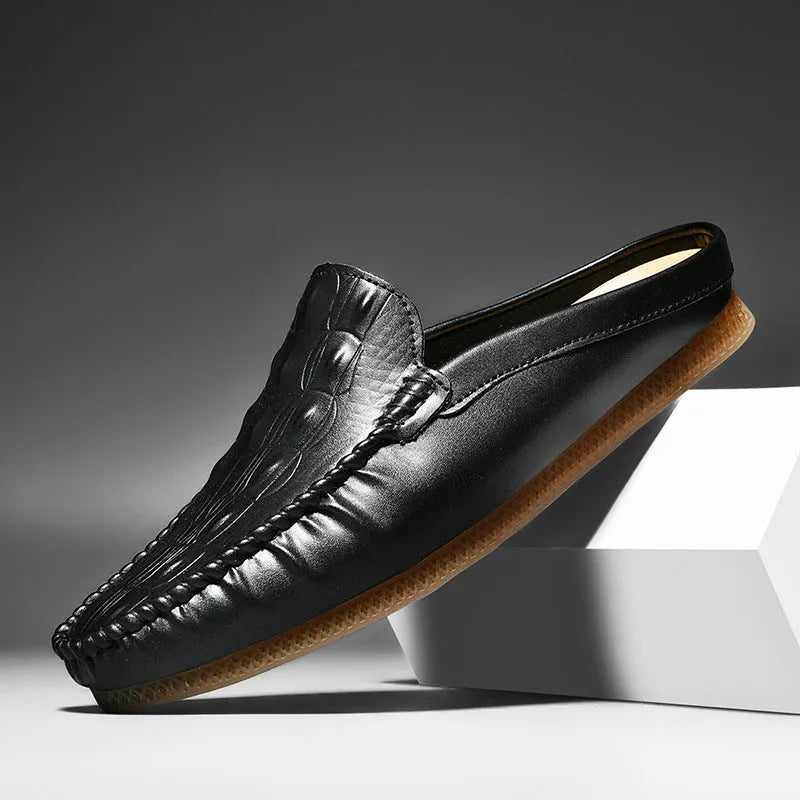 Men's black breathable semi-slippers with a textured rubber sole, shown from a side angle.