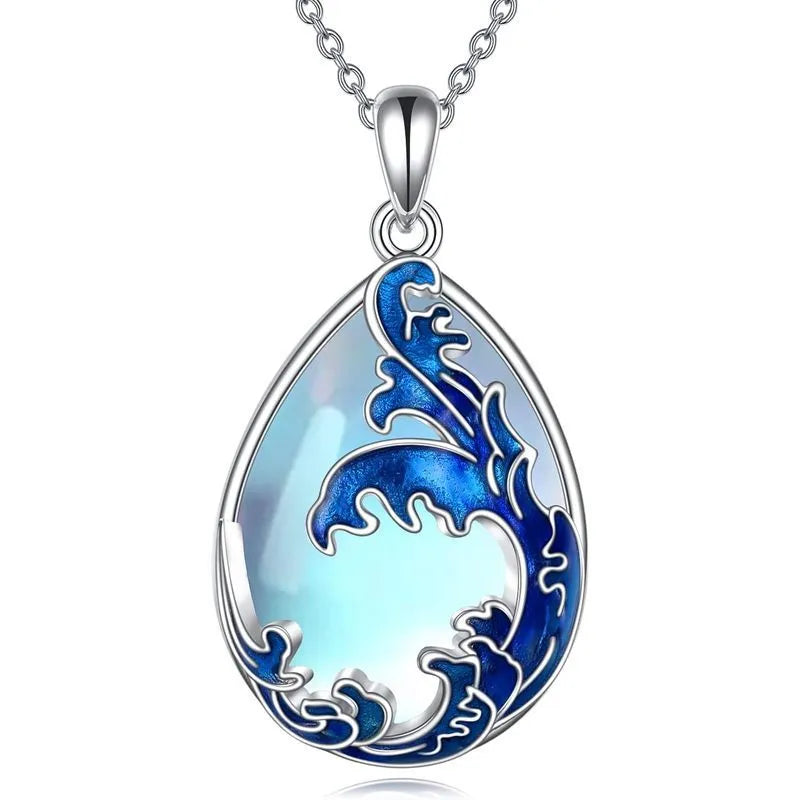 Blue heart-shaped alloy pendant on a chain, a women's necklace.