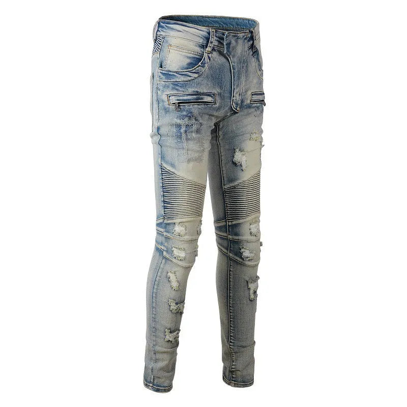 Light blue men's slim fit distressed jeans with hand-frayed detailing and a tapered leg.
