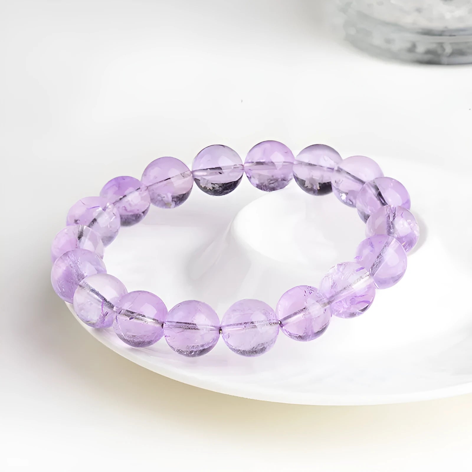 Lavender amethyst bracelet with water ripple texture on round beads in unisex design.