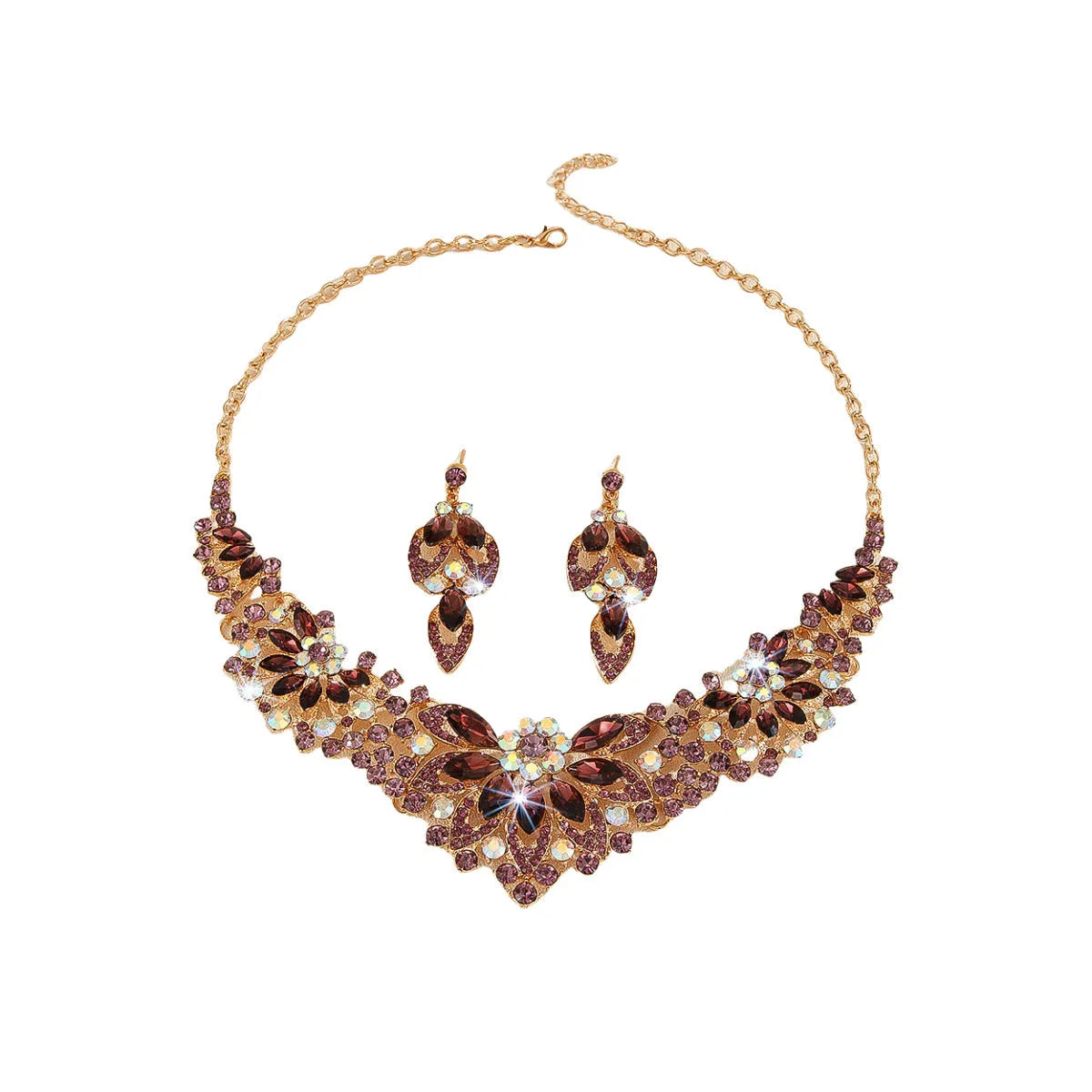 Gold high profile crystal necklace and earrings suite with exaggerated flower and wheat design on alloy