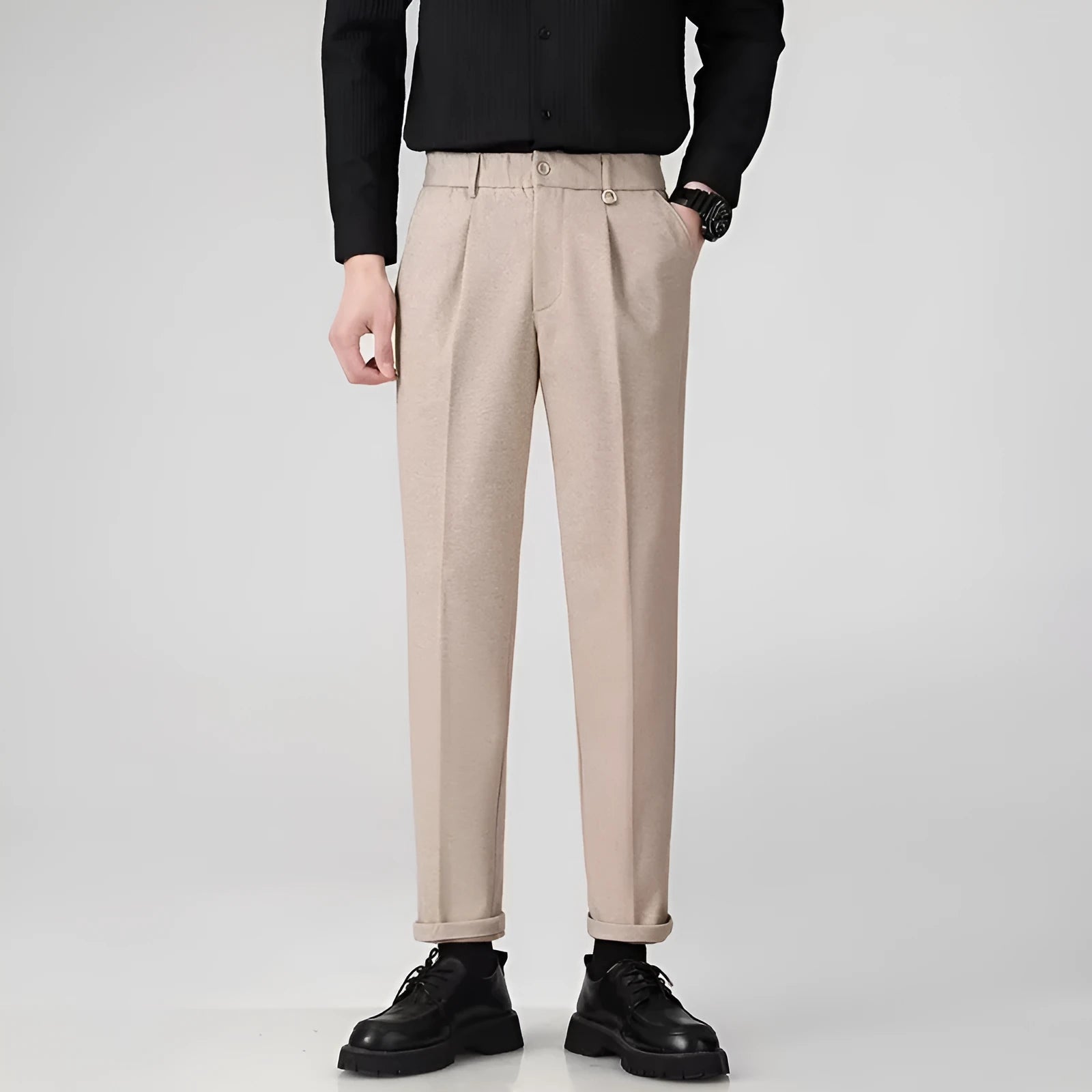 Men's straight-leg casual suit trousers in black, shown with a draped fit.