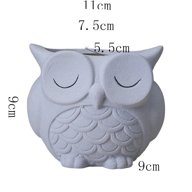 Handmade ceramic owl succulent pot in light pink with 11x9x9cm dimensions