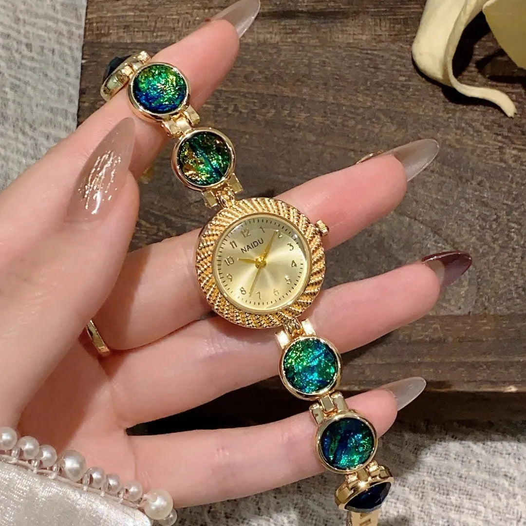Women's quartz watch with 25mm round dial in six colour options including milky white and dark green