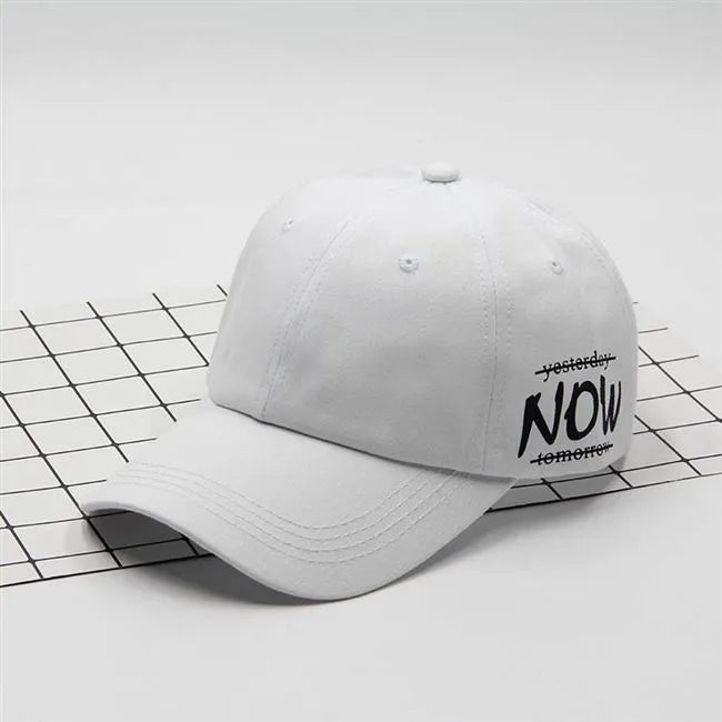 Cotton baseball cap with letter embroidery, curved brim, dome top, adjustable size, in green colour.