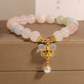 Women's crystal bracelet with colourful morganite butterfly pendant on an adjustable chain.