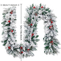 White flocked snow Christmas rattan vine decorative garland on green background
