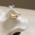Golden electroplated stainless steel ring with love heart shape and oval bath design