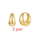 Golden brass diamond earclip earrings with geometric round design and butterfly backings