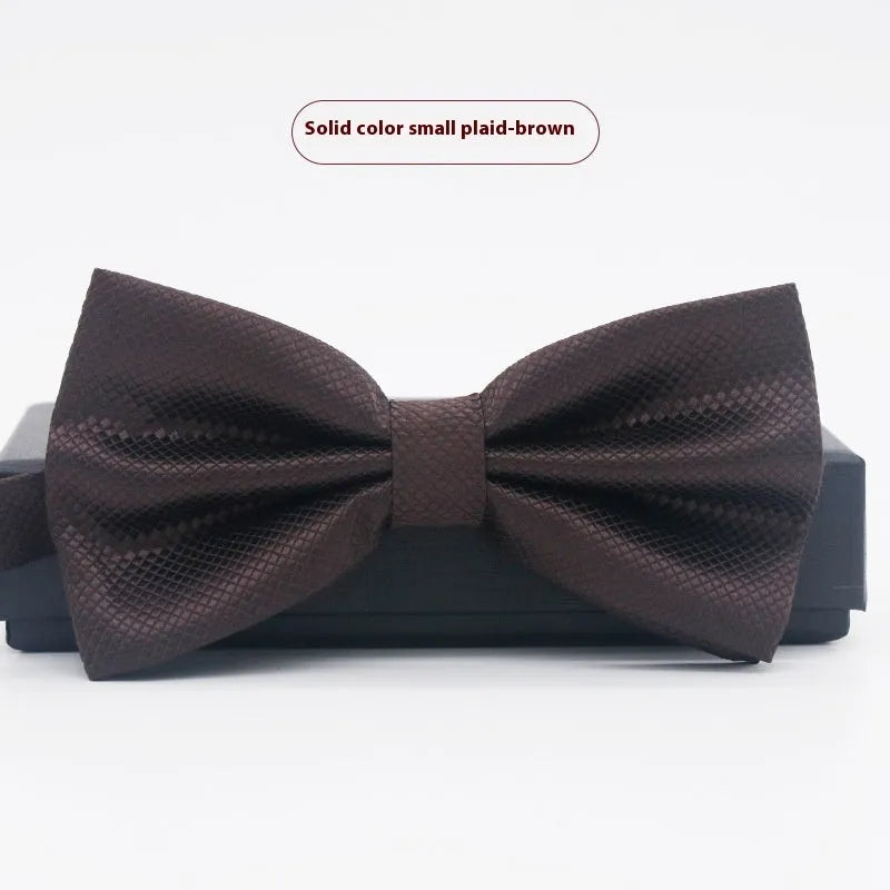 Solid colour polyester bow tie with flat head design measuring 12cm by 6cm