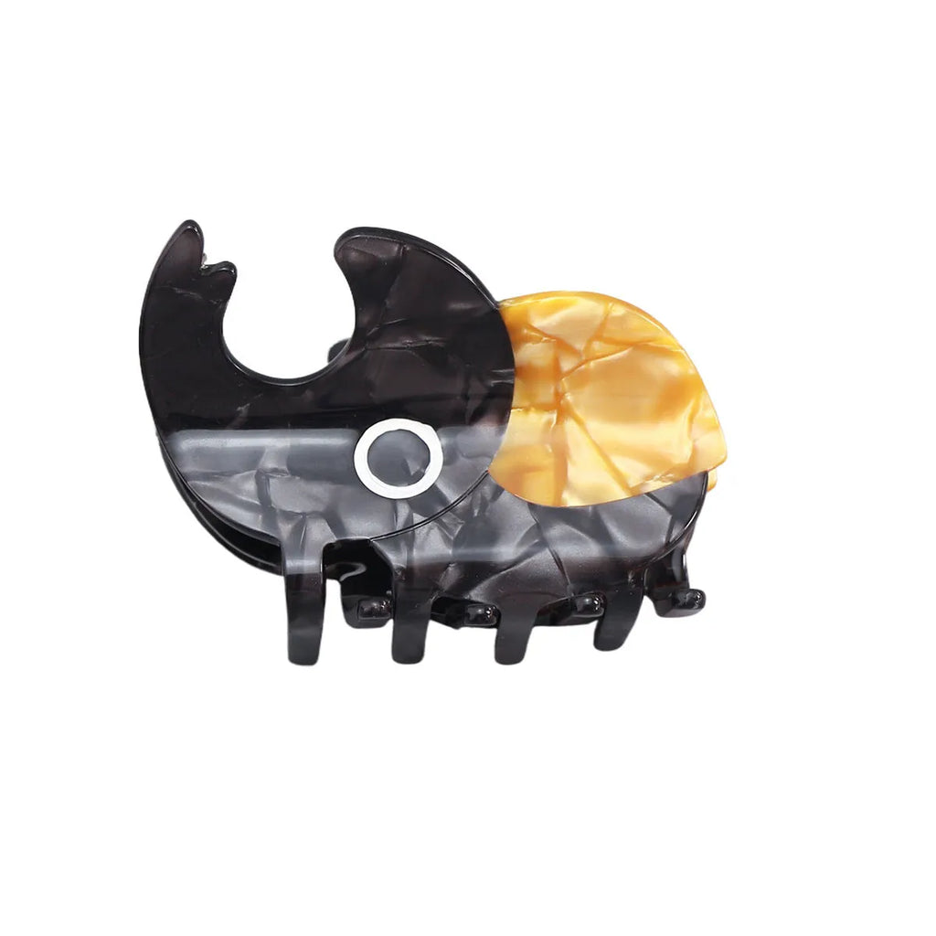 Handmade cellulose acetate insect beetle grip desk accessory with cartoon caterpillar design